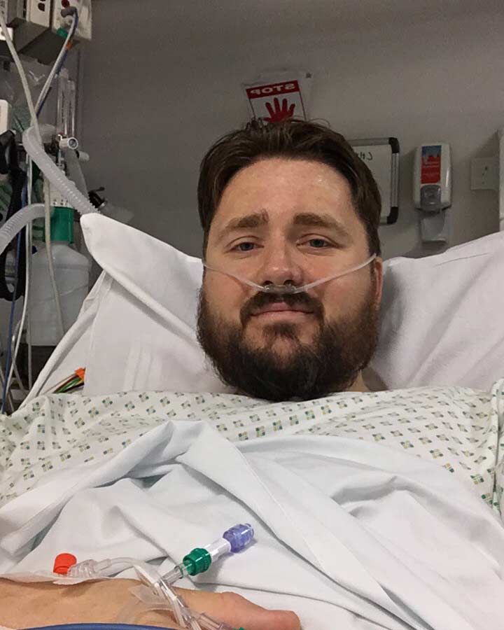 Chris in hospital after stoma surgery